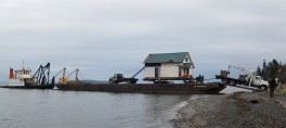 house arrives by barge