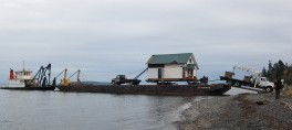 house arrives by barge