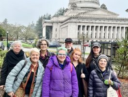 A delegation of Pea Patch supporters traveled to Olympia in January to advocate for funding and to tell their personal stories. From L-R: Deborah Sparks, Heather Stansbury, Suzanne Olson, Brita Brahce, Bob Morris, Bella Evans, Amanda Sparks and Linda Ellsworth.