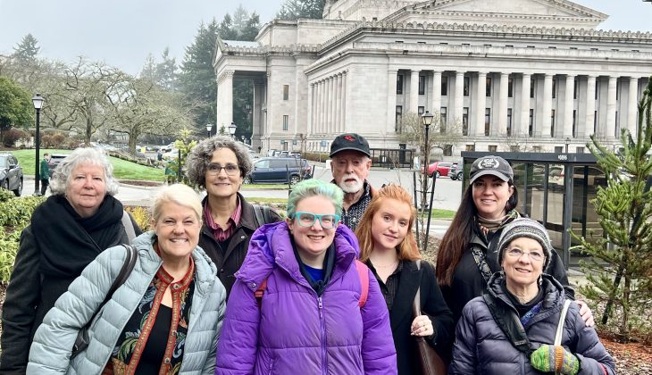 A delegation of Pea Patch supporters traveled to Olympia in January to advocate for funding and to tell their personal stories. From L-R: Deborah Sparks, Heather Stansbury, Suzanne Olson, Brita Brahce, Bob Morris, Bella Evans, Amanda Sparks and Linda Ellsworth.